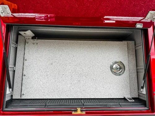 Rear corner compartment open view with interior bay and door hinges.